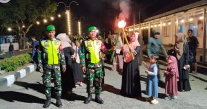 Momen Pelepasan Secara Simbolik Peserta Pawai Obor. Turut Hadir Perwakilan Koramil dan Polsek Bintauna